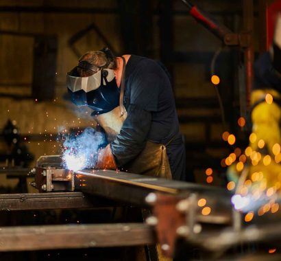 worker-with-welding-mask-and-safety-gear-welding-a-2025-04-01-13-22-30-utc worker-with-welding-mask-and-safety-gear-welding-a-2025-04-01-13-22-30-utc